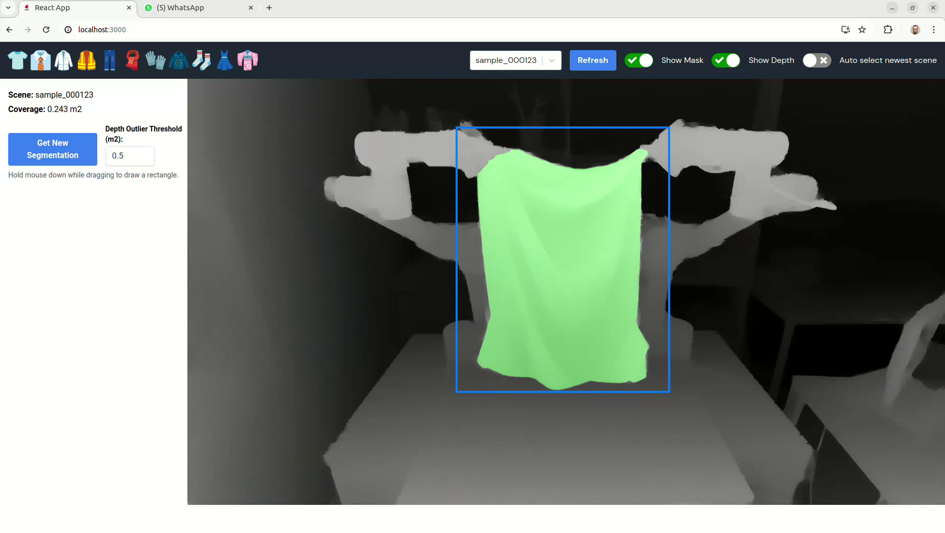 Cloth segmentation highlighted over the depth observation, with both robot arms visible